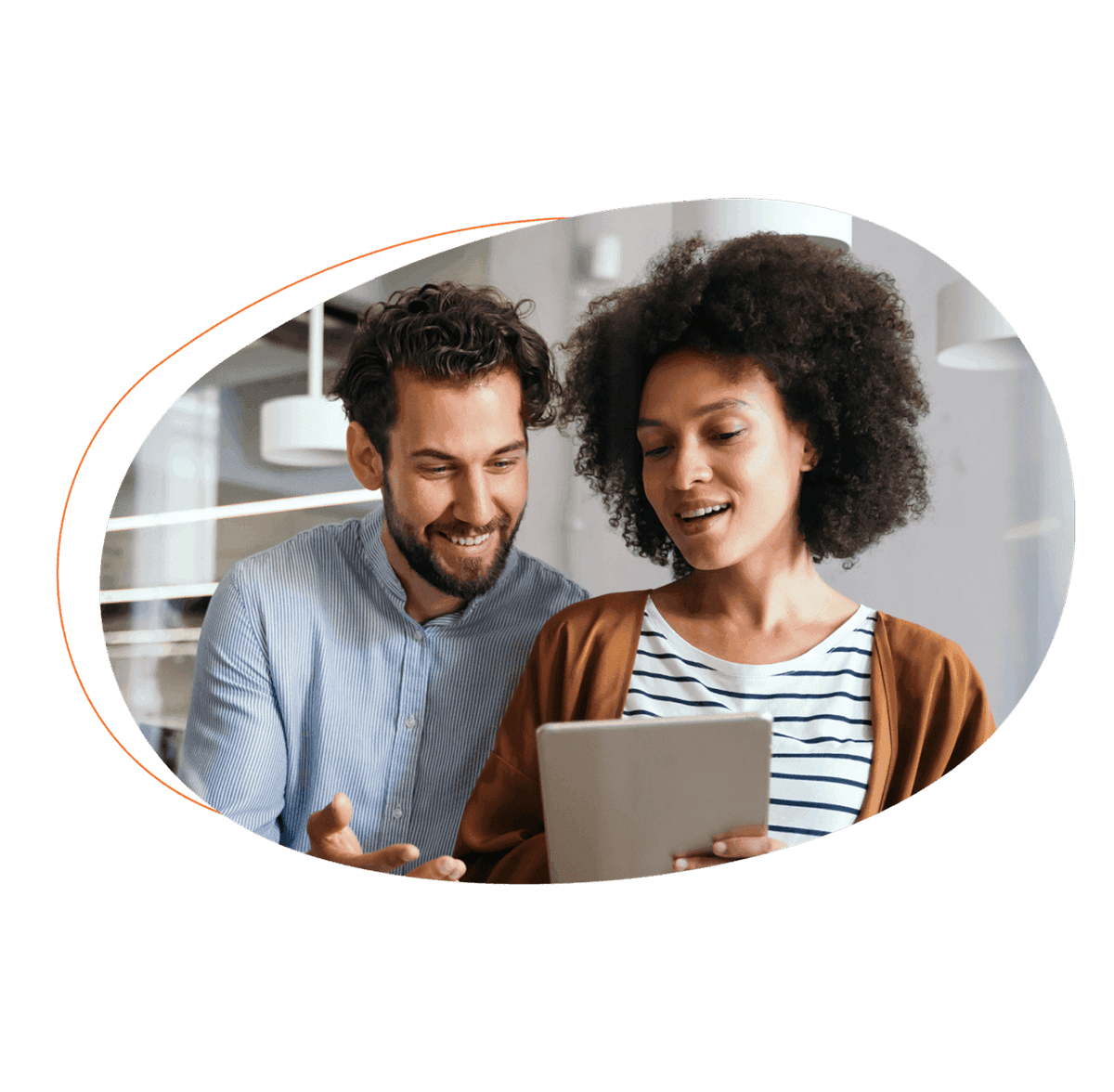 Two people looking at a tablet