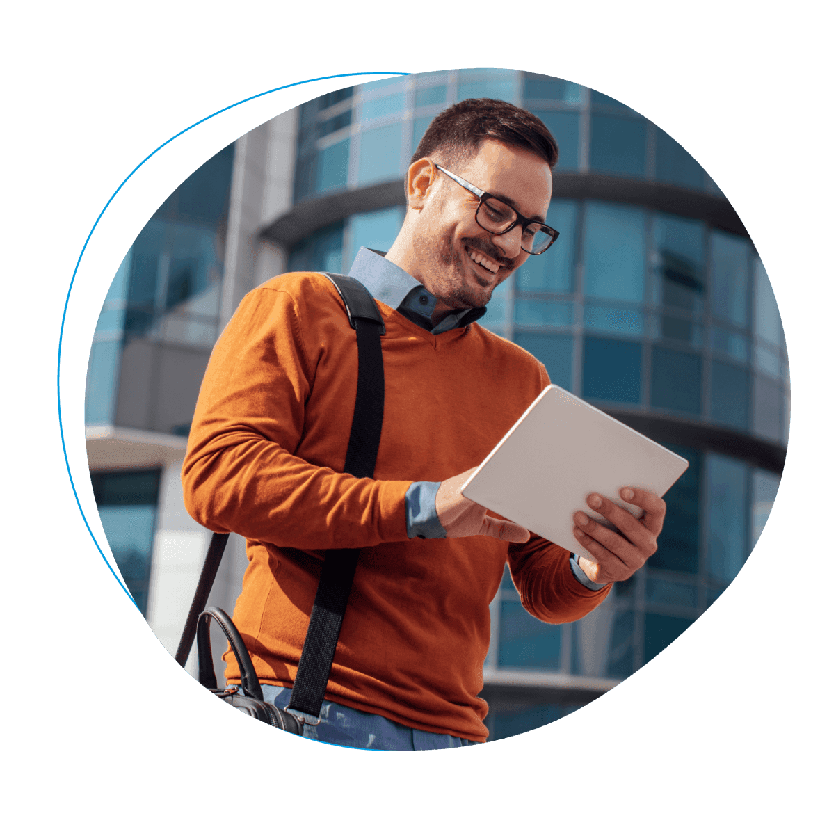 Smiling man looking at tablet