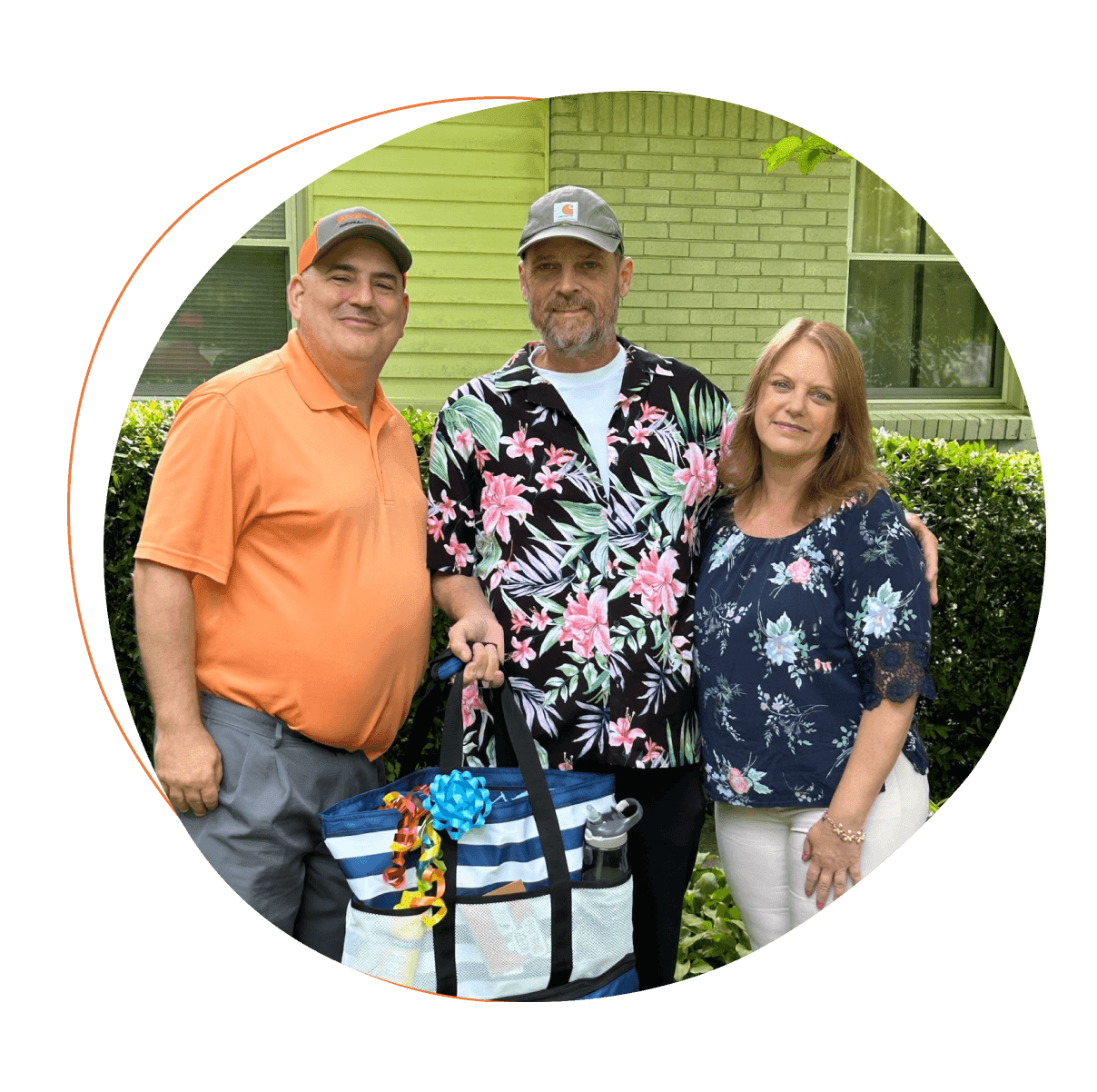 Three employees at a volunteer event