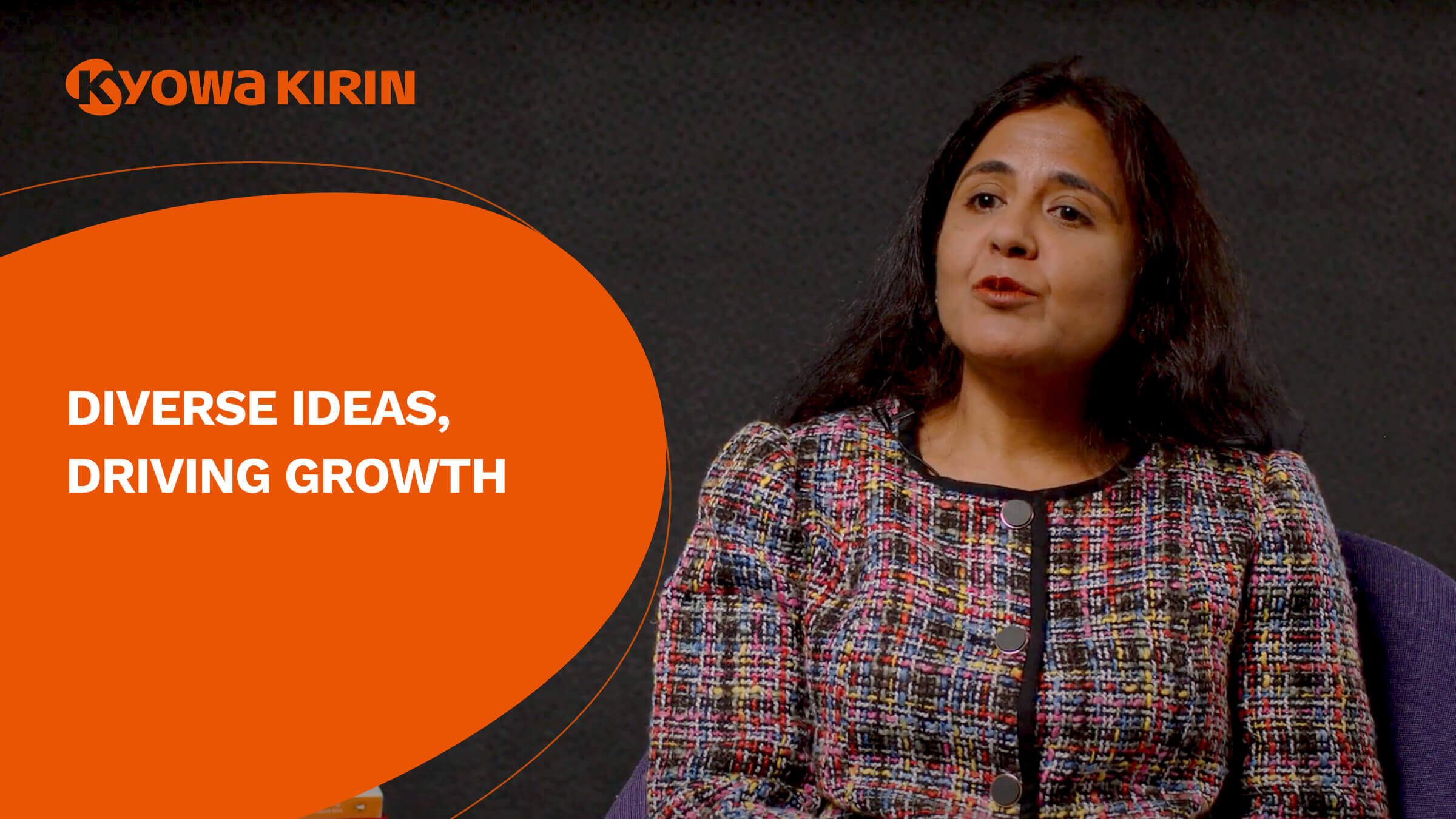 A woman is speaking from a seated position