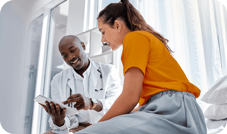 Doctor showing results to patient