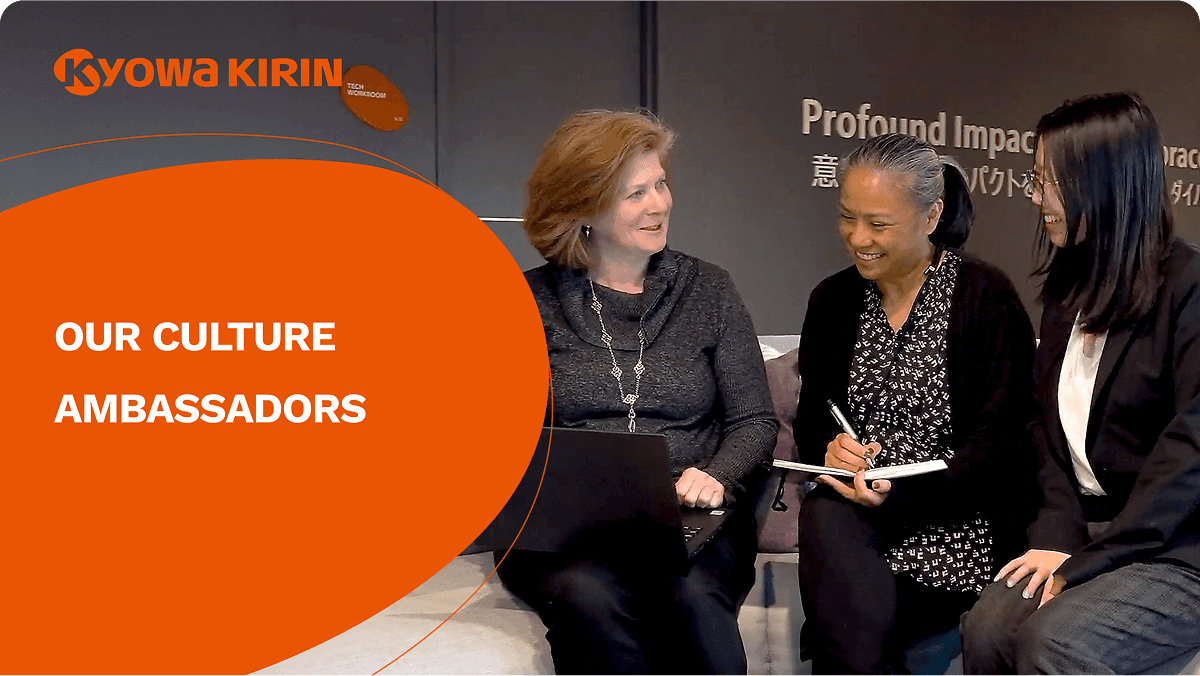 Three seated people talking