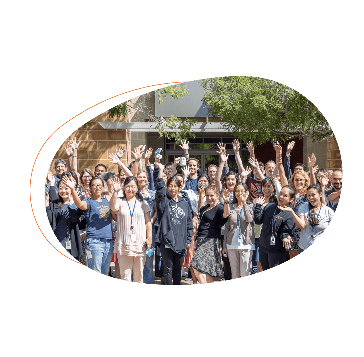 Large team event with everyone waving