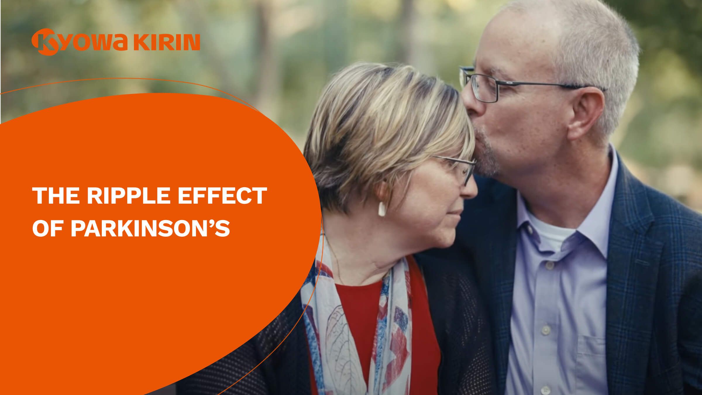 Husband kissing wife on forehead