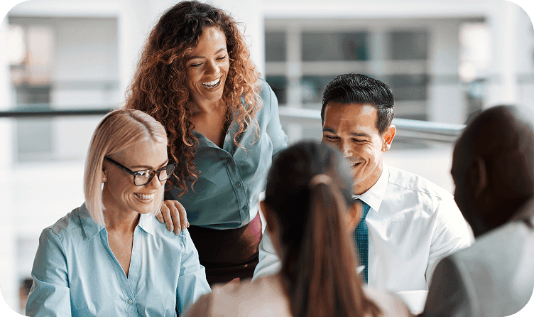 Workers sitting at an office table