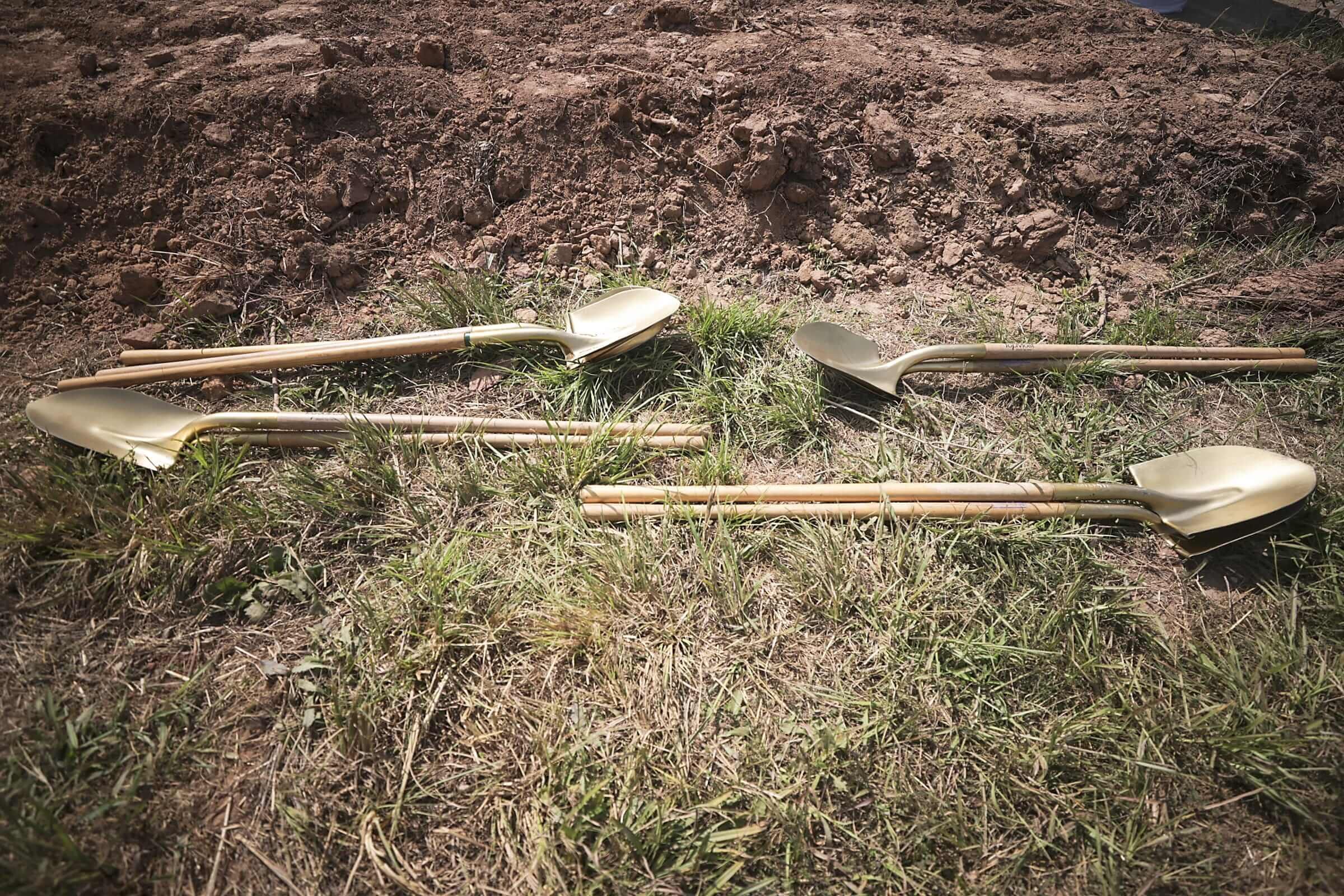 Shovels on ground at building site