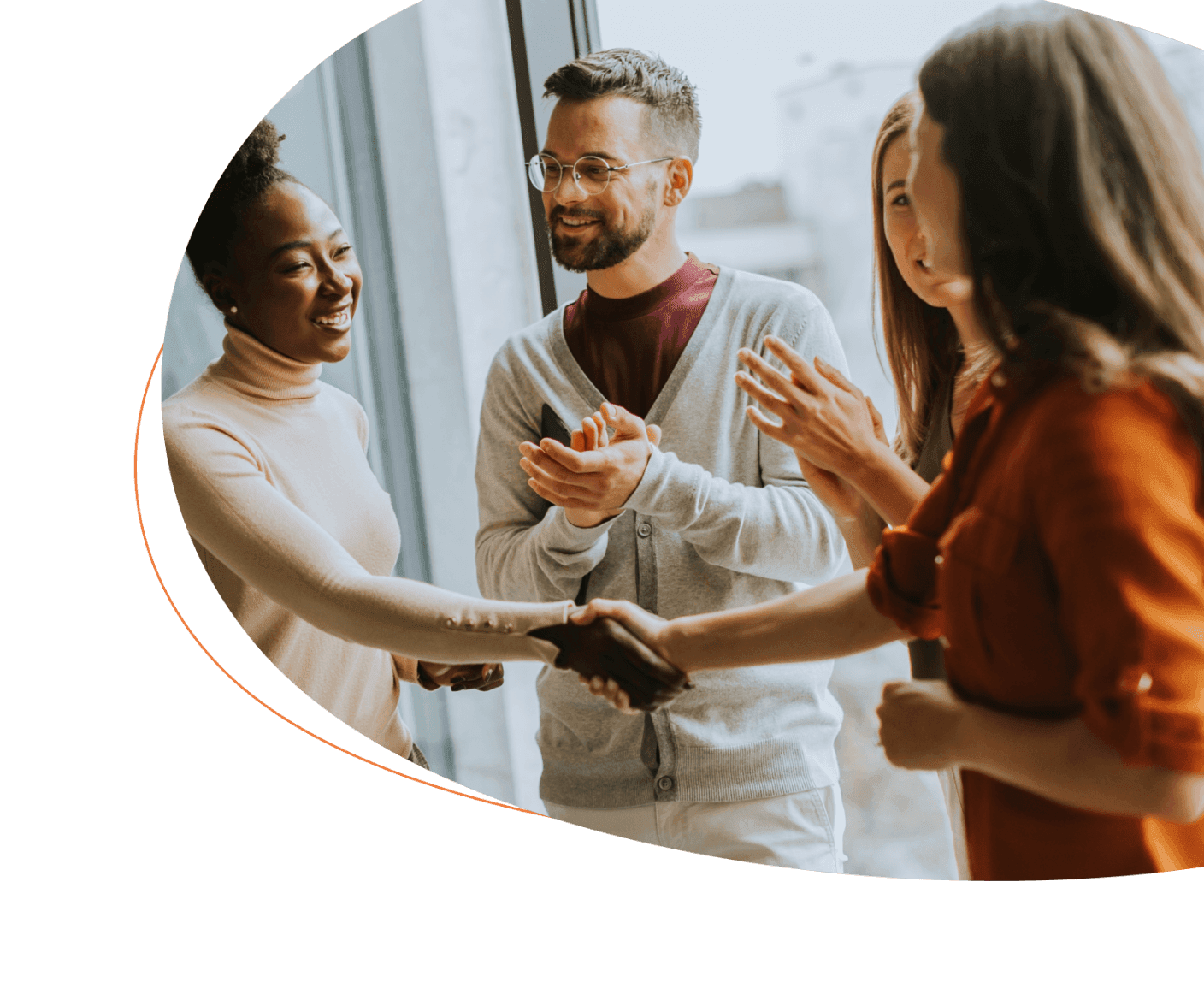 4 employees standing together