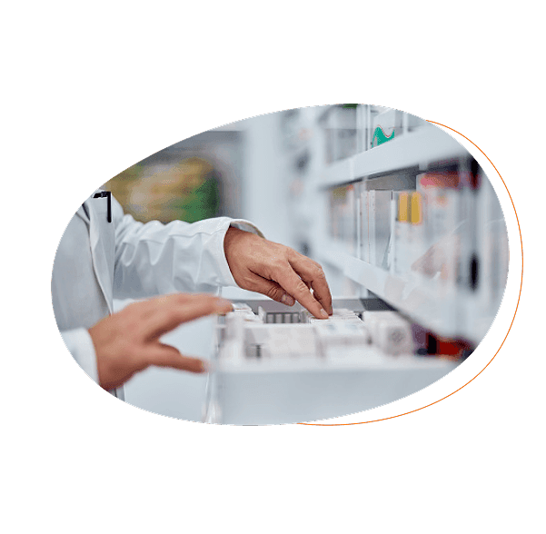 Man putting files in a drawer in a lab