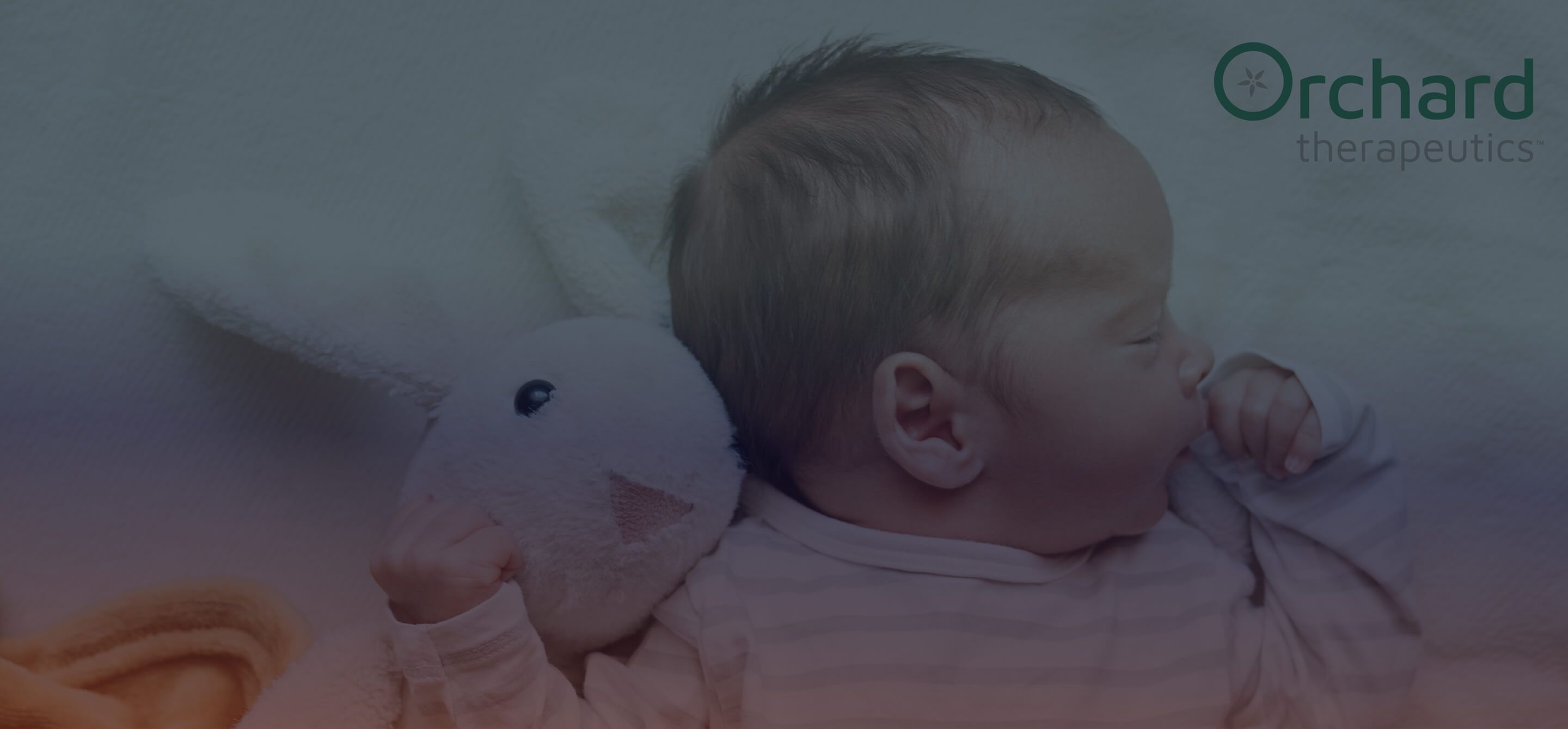 A baby on his back next to the orchard therapeutics logo