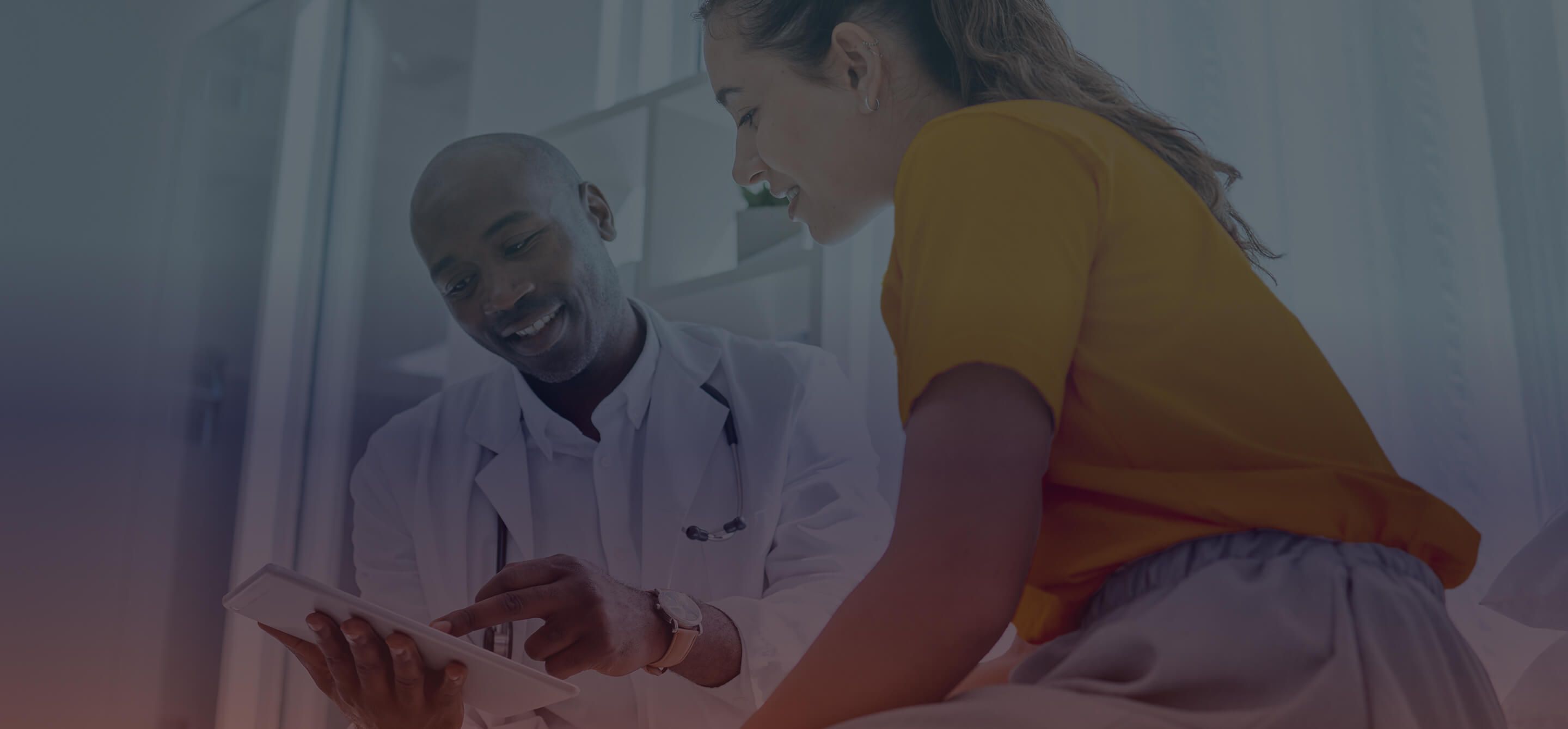 A doctor is showing information to his patient