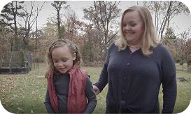 Mother and daughter walking