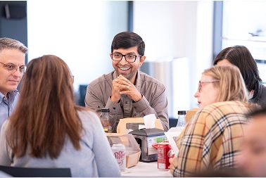 Group of people around office table