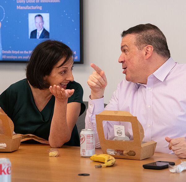 Two employees having lunch