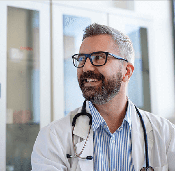 Smiling doctor wearing glasses