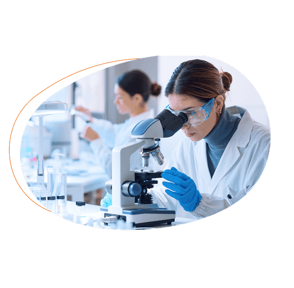 Female scientist at microscope